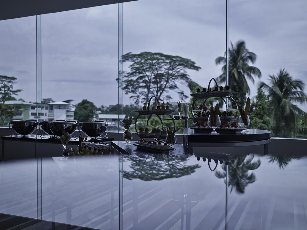 Pullman Kuching Hotel Exterior foto The interior of the National Museum of Singapore